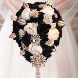 Dark wedding bouquet. Black and gold bridal bouquet. Great Gatsby wedding flowers. Cascade artificial flowers brooch bouquet.