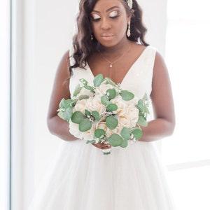 True touch ivory roses bouquet with eucalyptus Bride bouquet Wedding bouquets