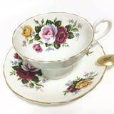 Vintage Crown Staffordshire, fine bone china, footed tea cup/saucer with rose bouquets, scalloped, gilded,