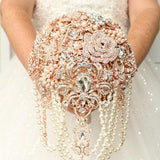 Rose gold luxury brooch bouquet. Pearl cascade bridal bouquet. Jeweled wedding bouquet