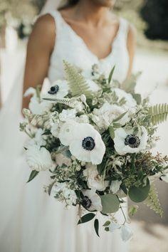 Beautiful white and green floral bouquet - black and white anemones, roses, ferns, veronica white flower, and seeded eucalyptus. Briar Barn Inn, an inn and restaurant on the North Shore. BriarBarnInn.com | Molly Quill Photography Flower Delivery
