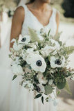 Beautiful white and green floral bouquet - black and white anemones, roses, ferns, veronica white flower, and seeded eucalyptus. Briar Barn Inn, an inn and restaurant on the North Shore. BriarBarnInn.com | Molly Quill Photography Flower Delivery