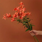 Quality Lily Stem Fake Small Orchid with Foliage Living Room Artificial Flower Decor Garden Wedding Party Table Arrangement Bouquet Material