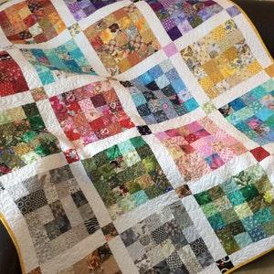 Scrappy patchwork lap quilt in multi colors, twin bed quilt, single bed topper, sunflower quilt, handmade and longarm quilted with feathers