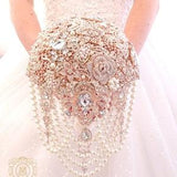 Rose gold cascading brooch bouquet
