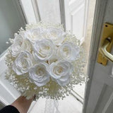 White classic royal wedding bouquet of the bride with a white rose and gypsophila lace ribbon dried flowers baby's breath boutonniere rustic