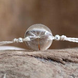 dainty flower bracelet with real dandelion seed in eco epoxy resin and white macrame string, size adjustable