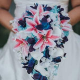 Cascading, teardrop bridal bouquet with tiger lilies, galaxy orchids, turquoise orchids, purple blue orchids, island, artificial flower