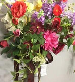 White Wicker Hanging Basket With Assorted Colorful Silk Flowers