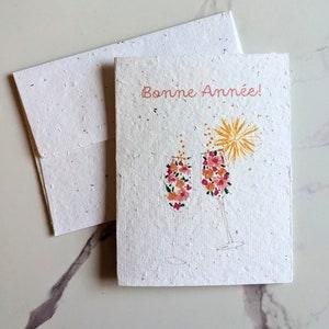 Flower champagne glasses on plantable seed paper or watercolor white paper, holiday  card