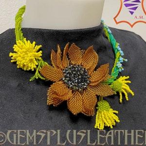 Handmade beaded floral necklace with golden sunflower, dandelions and forget-me-nots - Artisan one-of-a-kind jewelry by GemsPlusLeather