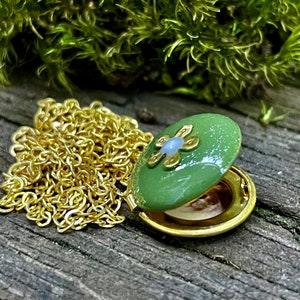 Tiny Green locket with daisy customized with photos