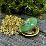 Tiny Green locket with daisy customized with photos