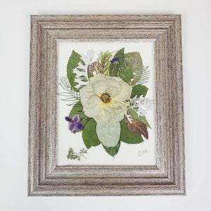 Pressed dried pink rose from a bridal bouquet, in a wooden frame for safekeeping, home d???cor or as a gift