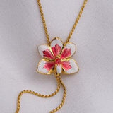 Necklace with real orchid in white / red, gold plated