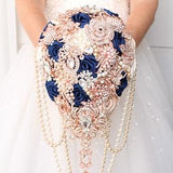 Brooch bouquet navy blue champagne rose gold. Cacsading wedding bouquet.