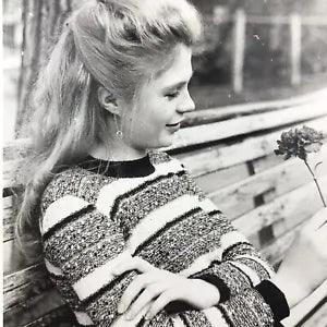 Vintage Black and White Photo Young Woman Looking At Carnation Flower Park Bench