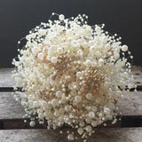 Bubble pearl wedding bouquet with rose gold snowflakes in large and small. Winter wedding bouquet. Brooch bouquet alternative.