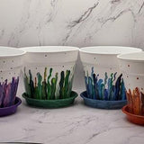 Hand painted 4" plastic pot "Seaweed" abstract in different colors ,with saucer finished with a protective clear coat. Very good drainage.