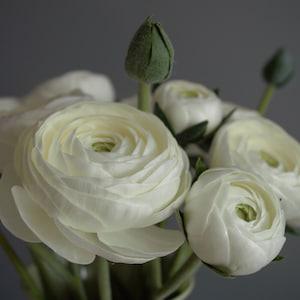 Ranunculus bouquet for home decoration. Flowers for a vase. Real touch flowers