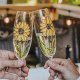 2 champagne glasses, 2 sunflowers are hand-painted, 9 oz. Gift, wedding, anniversary or friends!