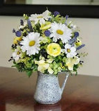 Vintage Sponge Ware Pitcher with Silk Blue, Yellow and White Arrangement