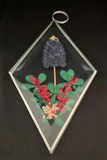 Small vintage pressed flowers wall or window hanging.