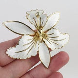 Vintage white enamel orchid by Aksel Holmsen Norway sterling silver with gold vermeil signed brooch