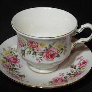 ROYAL VALE Bone China tea cup and saucer set patt no 8583 Pink yellow floral bouquet rose daisy vintage tea cup