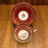 Aynsley Fine Bone China Burgundy and Gold Filigree Teacup and Saucer With a Pink Rose Bouquet of Flowers in the Center