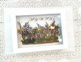 dried pressed flowers in wood frame with caligraphy?