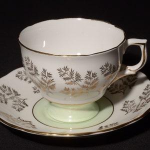 COLCLOUGH mint green tea cup and saucer pattern 7041 numbered Gold gilded plants England Vintage teacup Bone China