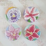 Flower buttons with- Azalea, Lily, Pansy,and Orchid