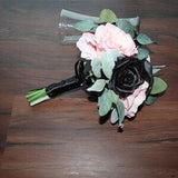 Modern pink and black bridesmaids bouquet, pink peonies and roses. Black roses/calla lilies. Eucalyptus and lamb ear wrapped in black satin.