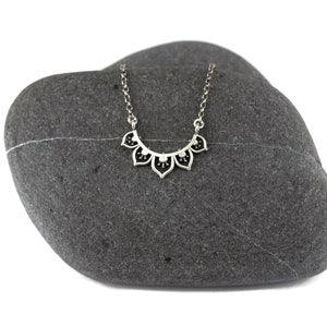 Small Flower Bib Pendant