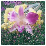 Pendant  made with real orchid Dendrobium and resin.