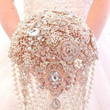 Wedding bouquet Pearl cascading Luxury full jeweled rose gold brooch bouquet.