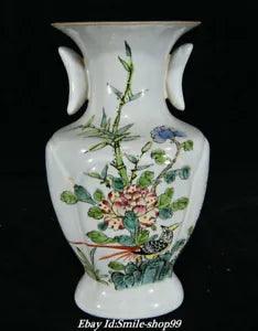 Porcelain vase with white body and painted peony and garden floral scene