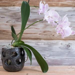 Handmade black ceramic decorative planter. Black pottery pot with decorative holes. Especially suitable for Moth orchids. Nordic minimalism.