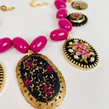 GILD THE LILY Magenta Pillow Beads Support Black and Purple Flower Pendants in Embroidery, Resin, and Cloisonn¡§?