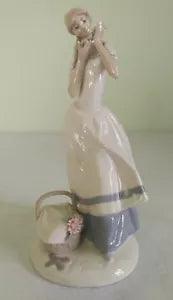 Lladro's Fulgenio Garcia Lopez Cecilia the Carnation Maiden fine porcelain 9 1/2