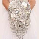 Silver cascade brooch bouquet. Wedding diamond bouquet. Keepsake wedding flowers