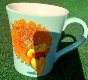 Disney Store Winnie the Pooh Blue Coffee Mug Orange Carnation Flower