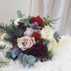 Winter bridal bouquet Woodland wedding Blush White red roses Pine cones Rustic Bride flowers  Berries Spruce