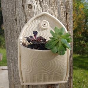 Plant Pockets are the perfect home for succulents and small orchids. Can be used indoors or out.
