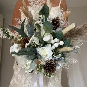 Josephine' rustic winter wonderland wedding bridal bouquet pine cone pampas glitter buds white rose eucalyptus
