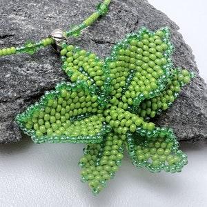 Orchid necklace Flower jewelry Green beaded necklace Floral necklace Pendant necklace Cottagecore jewelry Nature jewelry Unique gift for her