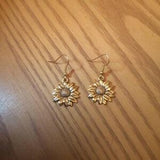 Boucles d??oreilles en or antique tournesol