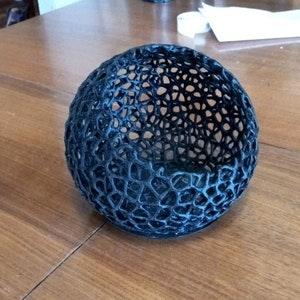 Orchid Voronoi spheres pattern with built in basin