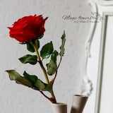 Red rose artificial flower out of cold porcelain